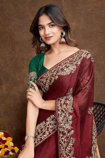 Maroon Colored Embroidered With Stone Work Rangoli Silk Saree With Green Colored Blouse Peice