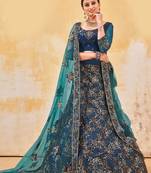Marvellous Peacock Rama Blue Dual Sequins and Thread Embroidered Bridal Net  Semi Stitched Lehenga choli