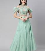 Turquoise embroidered
 organza stitched lehenga