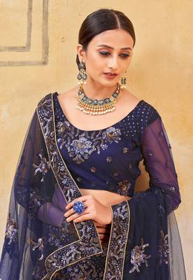 hypnotizing Peacock Blue Double Multi Sequins and Thread Embroidered Bridal Net  Semi Stitched Lehenga choli 2