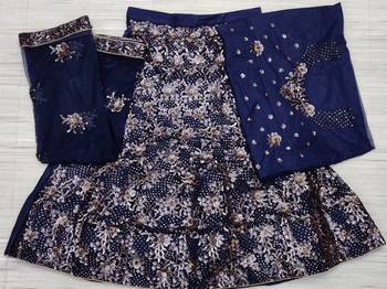 hypnotizing Peacock Blue Double Multi Sequins and Thread Embroidered Bridal Net  Semi Stitched Lehenga choli 3
