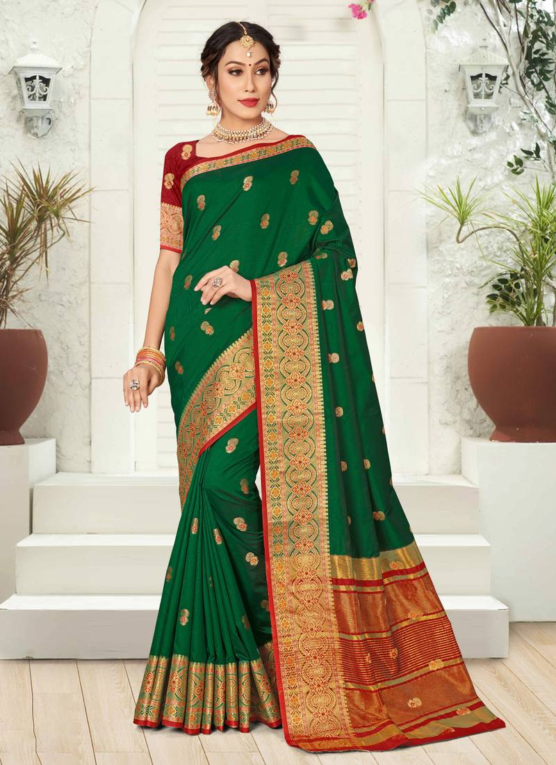 Dark green woven silk saree with blouse
