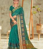 Turquoise embroidered organza saree with blouse