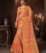Orange embroidered organza saree with blouse