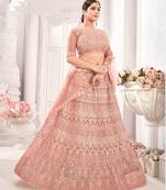 Peach embroidered net semi stitched lehenga