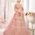 Peach embroidered net semi stitched lehenga