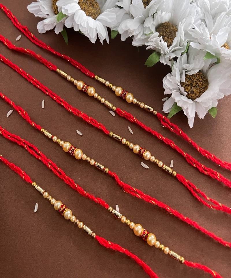 Rakhi Set of 6) Beautiful Simple Pearl Rakhi With Beads Red Thread