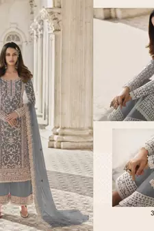 Grey Color Net Fabric Salwar Suit In Net Fabric With Embroidery As