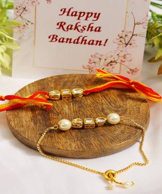 Gold-Toned Kundan Embellished Rakhi & Lumba Set of 2  1