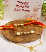 Gold-Toned Kundan Embellished Rakhi & Lumba Set of 2 