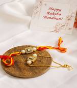 Handcrafted Studded Kundan Rakhi & Lumba Set Of 2