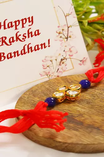 Red Gold Toned Blue Beaded Kundan Rakhi