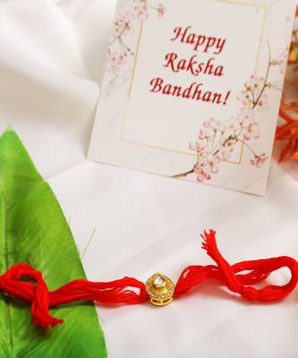High Quality Kundan Studded Rakhi With Yellow Cotton Thread 1