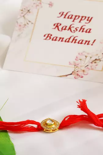 High Quality Kundan Studded Rakhi With Yellow Cotton Thread