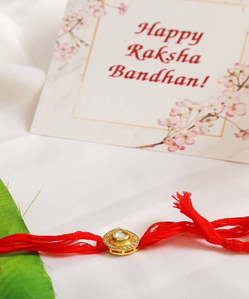 High Quality Kundan Studded Rakhi With Yellow Cotton Thread