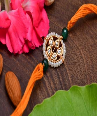 Kundan Floral Gold Tone Kundan Rakhi With Organish Yellow 1