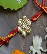 Kundan Floral  Gold Tone Kundan Rakhi With Red Yellow Cotton Thread
