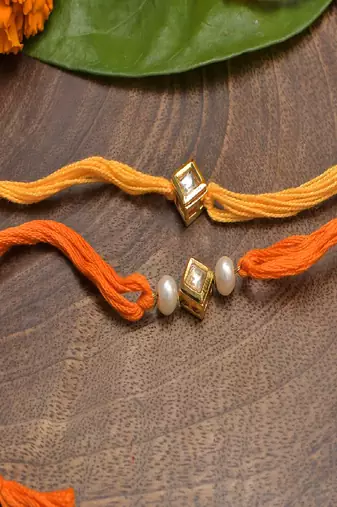 Kundan And Pearl Handmade Rakhi- Set Of 2