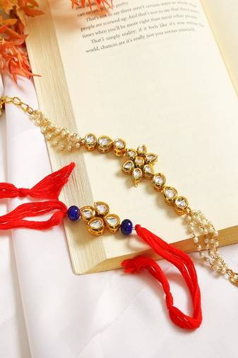 Gold-Toned Kundan Embellished Rakhi & Floral Lumba Set Of 2 