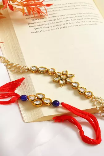 Gold-Toned Kundan Embellished Rakhi & Floral Lumba Set Of 2 