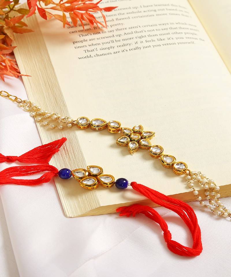 Gold-Toned Kundan Embellished Rakhi & Floral Lumba Set Of 2 