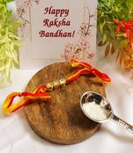 Gold Tone Kundan Rakhi With Red Yellow Cotton Thread