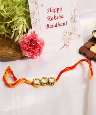 Gold Tone Kundan Rakhi With Red Yellow Cotton Thread 1