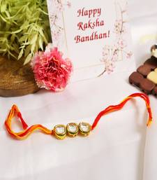 Gold Tone Kundan Rakhi With Red Yellow Cotton Thread