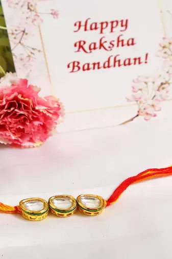 Gold Tone Kundan Rakhi With Red Yellow Cotton Thread