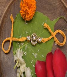 High Quality Kundan Studded Rakhi With Yellow Cotton Thread