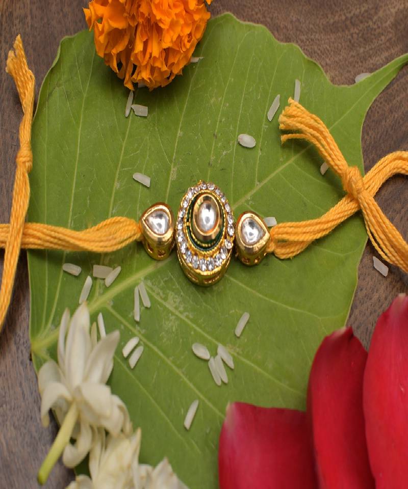 High Quality Kundan Studded Rakhi With Yellow Cotton Thread