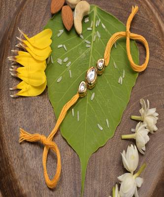 Gold Tone Kundan Rakhi With Yellow Cotton Thread 1