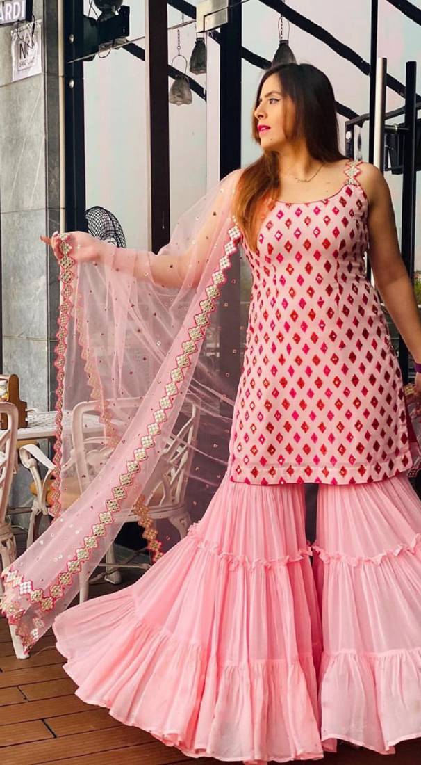 Captivating Baby Pink Faux Georgette multi layered party wear Sharara suit