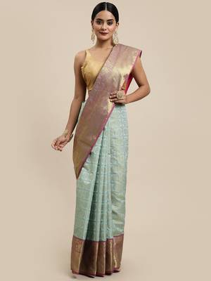 Sea green woven silk saree with blouse 1