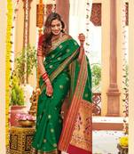 Green woven banarasi silk saree with blouse