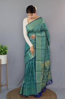 Teal woven banarasi saree with blouse