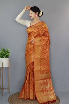 Orange woven banarasi saree with blouse