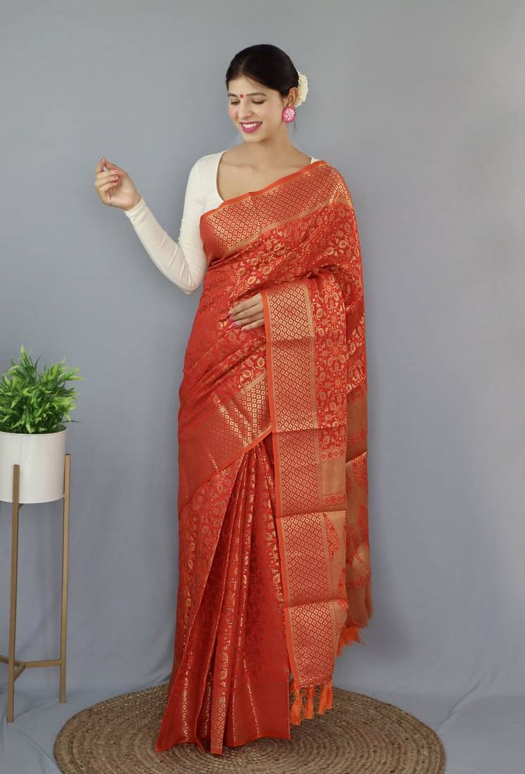 Red woven banarasi saree with blouse