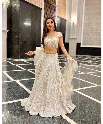 Warm White Sequins Worked Georgette Semi Stitched Lehenga Choli 1