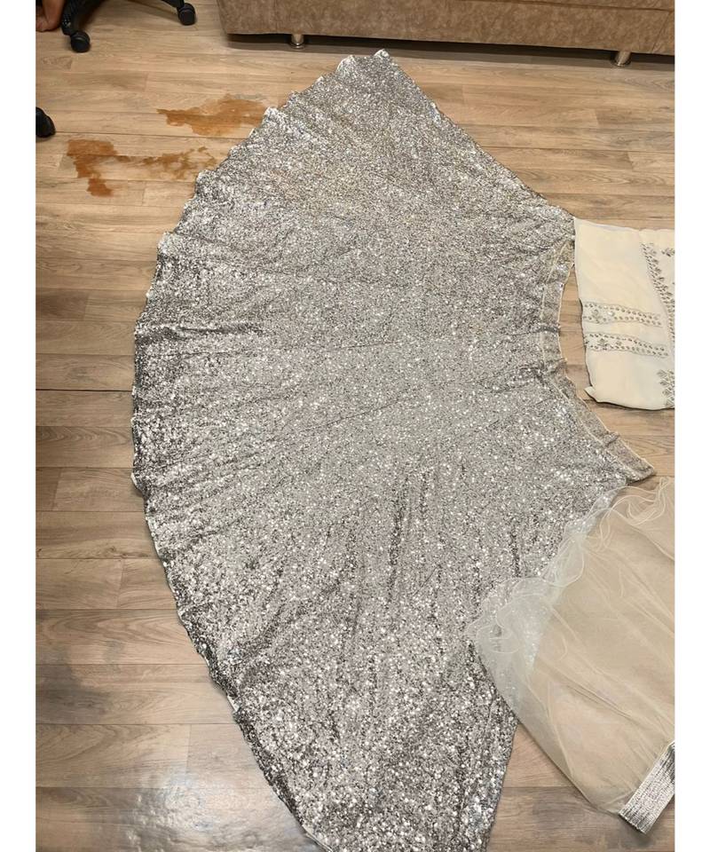 Warm White Sequins Worked Georgette Semi Stitched Lehenga Choli