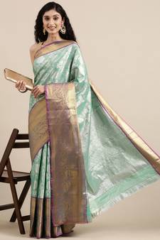 Green woven banarasi silk saree with blouse