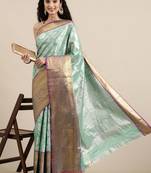 Green woven banarasi silk saree with blouse