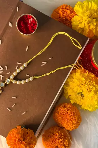 Traditional Kundan Pearl Studded Lumba Rakhi for Bhabhi 