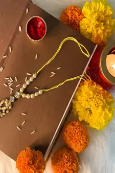 Traditional Kundan Pearl Studded Lumba Rakhi for Bhabhi 