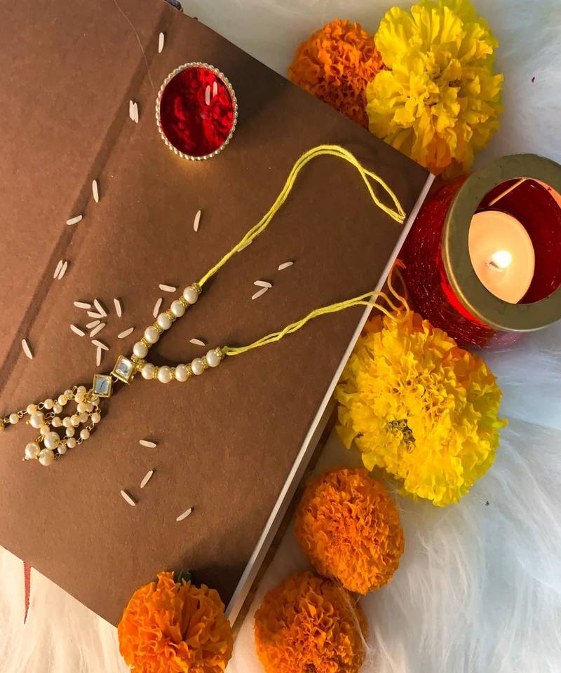 Traditional Kundan Pearl Studded Lumba Rakhi for Bhabhi 