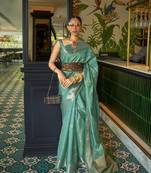 Light green woven organza saree with blouse
