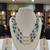 White pearl necklaces