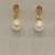 White pearl earrings
