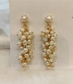 White pearl earrings