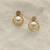 White pearl earrings